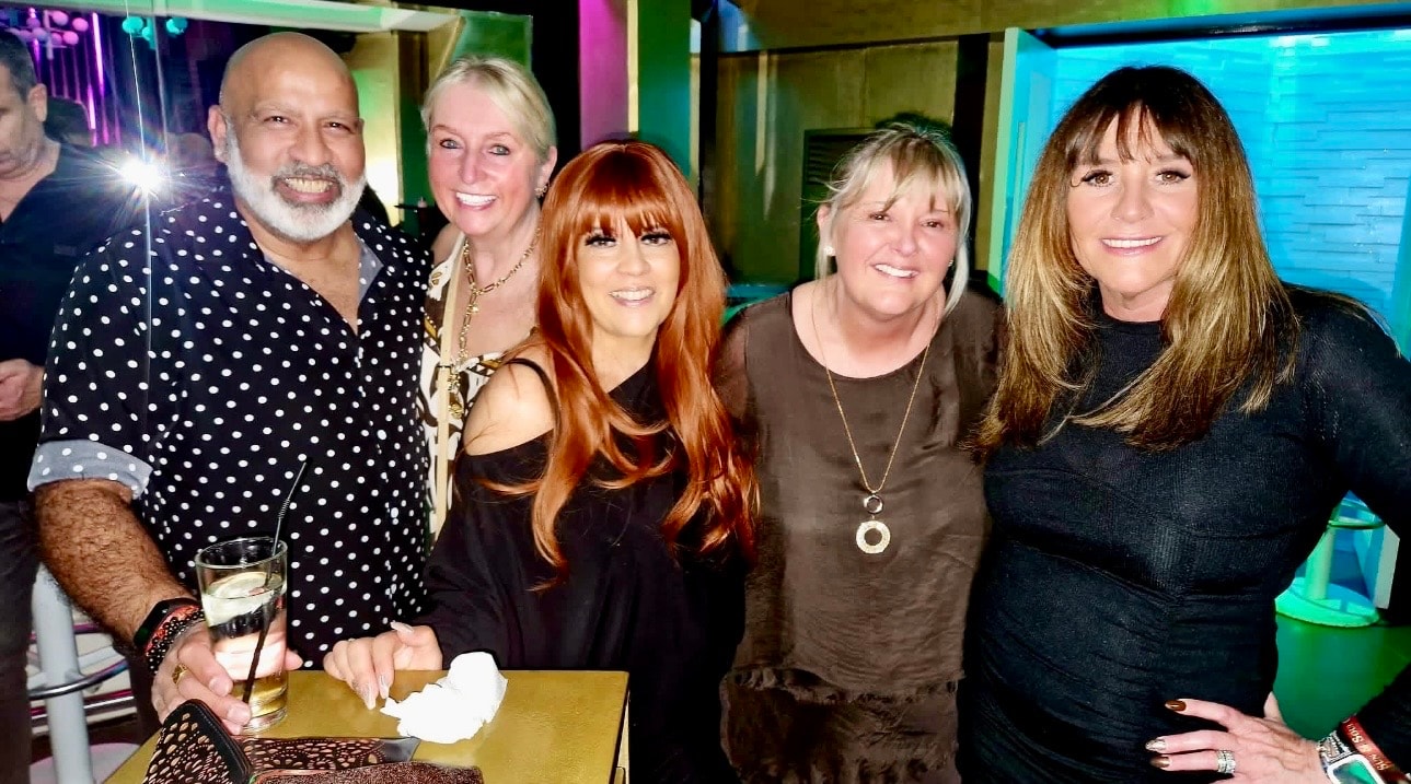 Large group of friends celebrating together at Sun & Soul Cyprus 2026