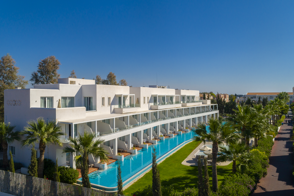Guests relaxing beside the swim-up pool at SUN & SOUL CYPRUS